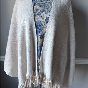 Elegant Cream Sweater with Fringe